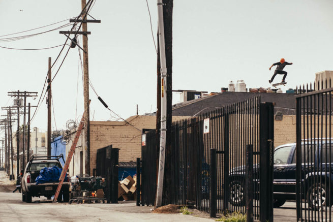 LA rooftop downtown los angeles skater ollie one foot longboard transfer